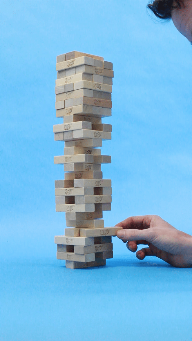 layout by flywheel cinemagraph photoshop come tutorial uomo che scuote la torre di jenga